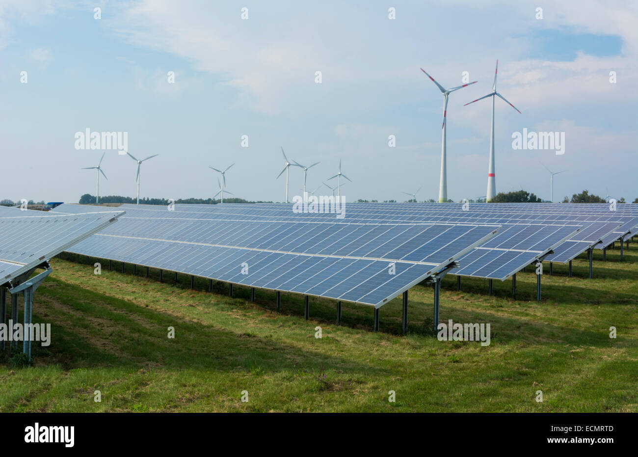 Germany wind energy turbines and solar panels ecology in field near