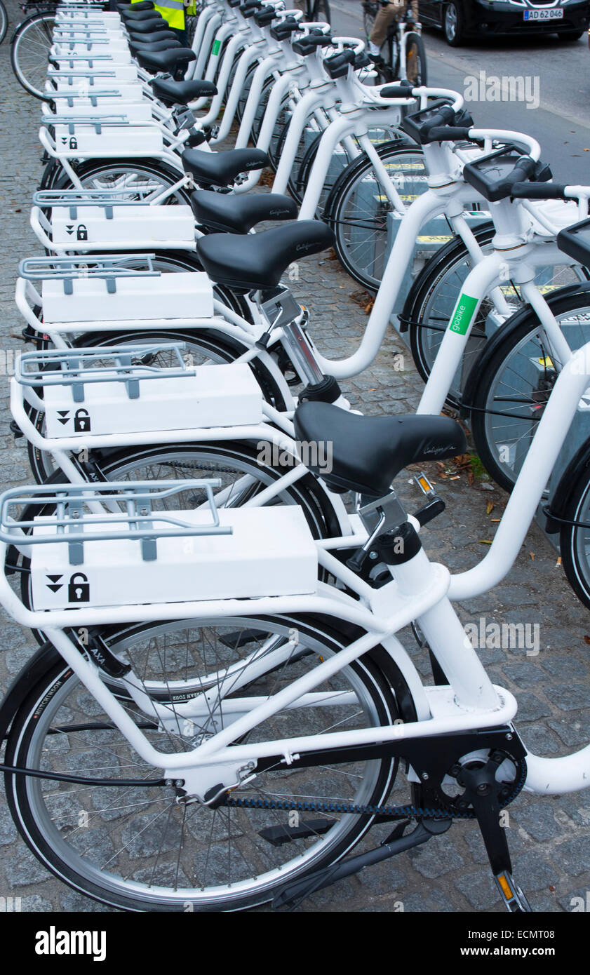 Copenhagen Denmark bikes for rent in line on street bicycles Kobenhavn