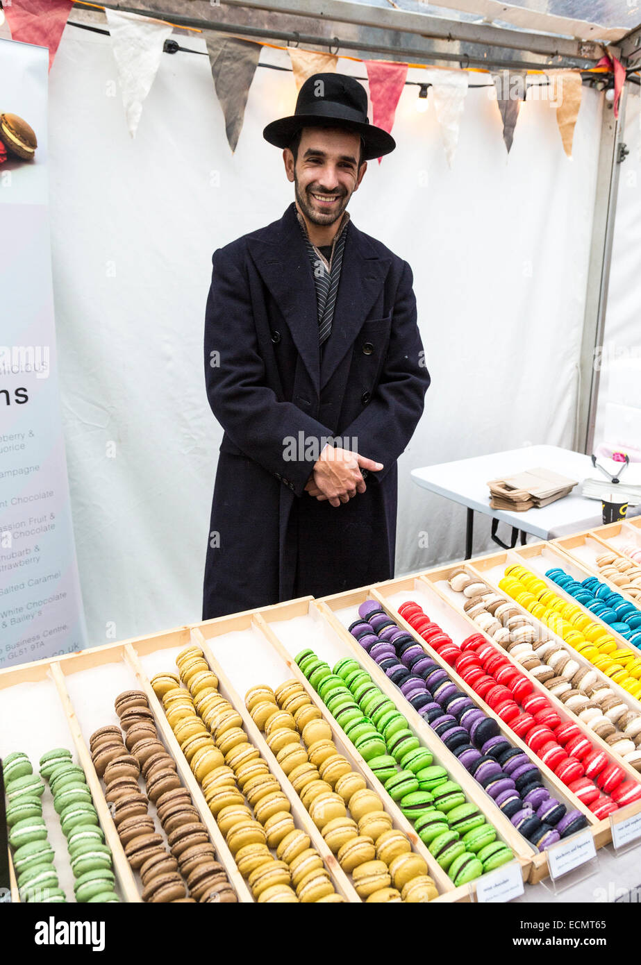 Market stall selling macaroons at the Christmas Food Festival, Abergavenny, Wales, UK Stock Photo