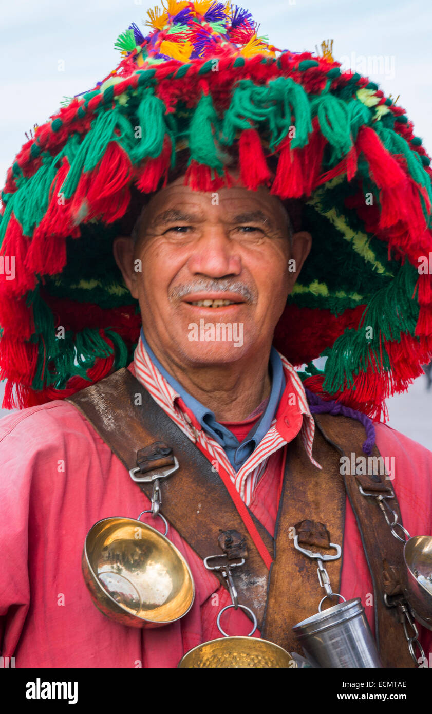 Marrakech Morocco traditional dress of local man in dress with bells in Old  Medina Stock Photo - Alamy