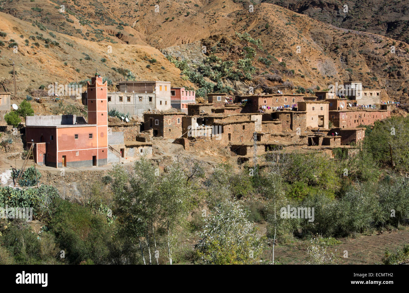 Morocco Taddart in Atlas Mountains old homes on cliffs in village poor