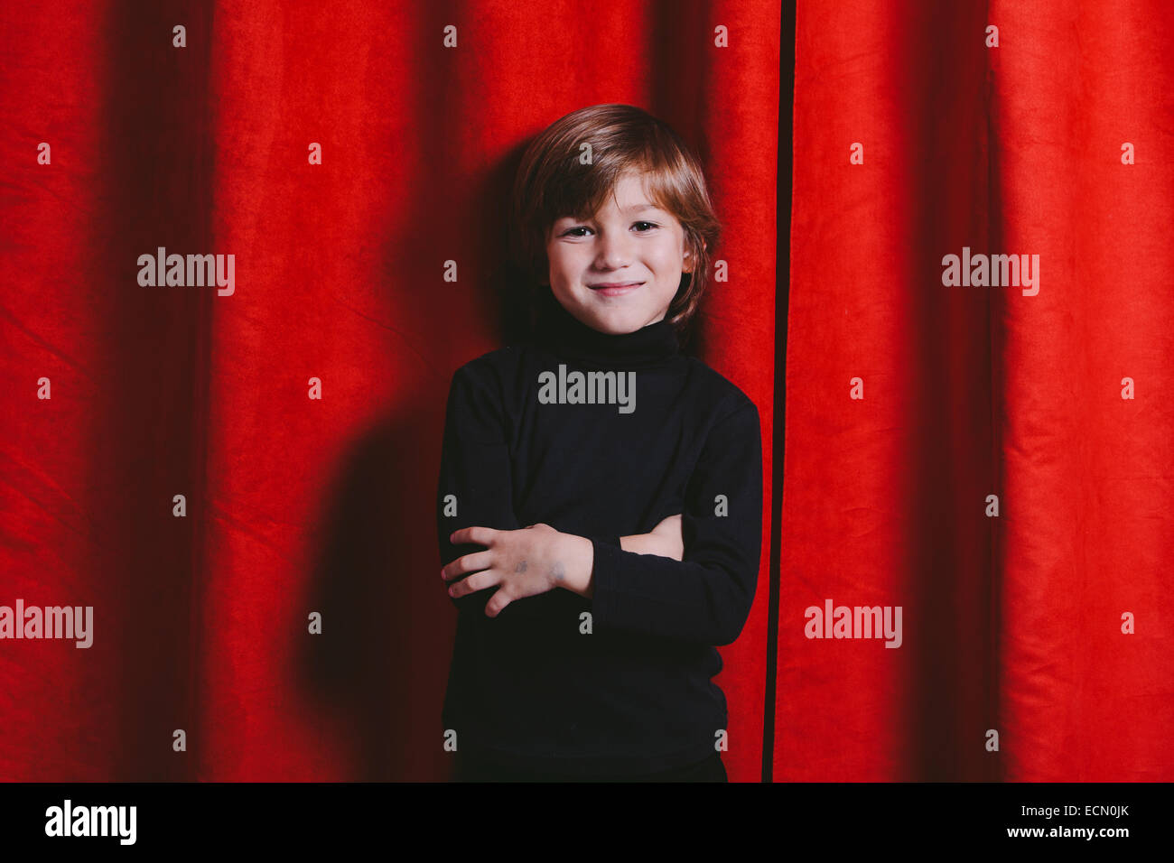 Studio portrait of a five years old boy wearing black clothes Stock Photo