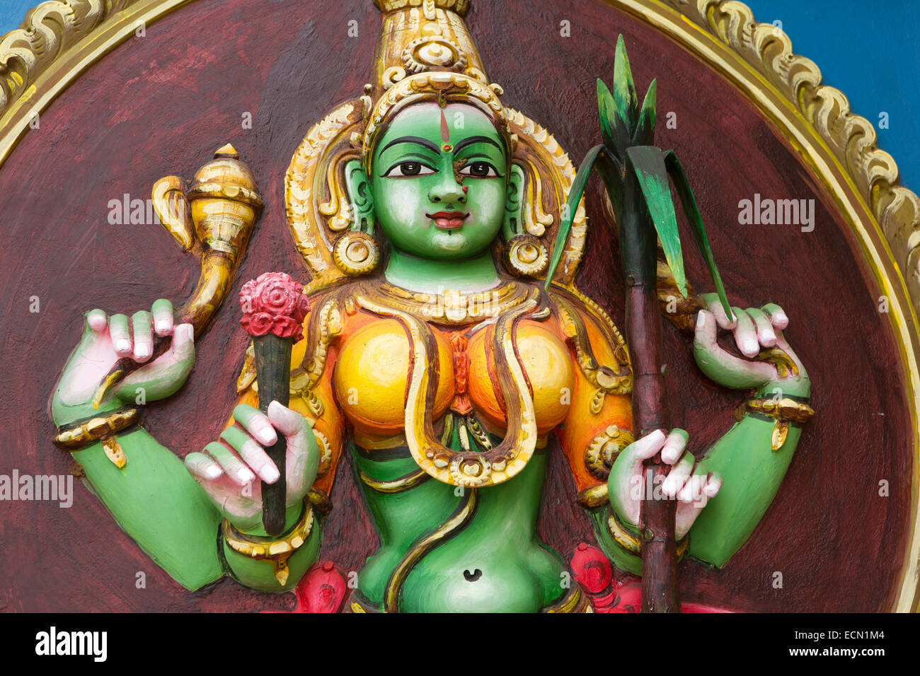 Mauritius, Mahebourg, Hindu temple, colourfully painted figure of goddess Saraswati Stock Photo