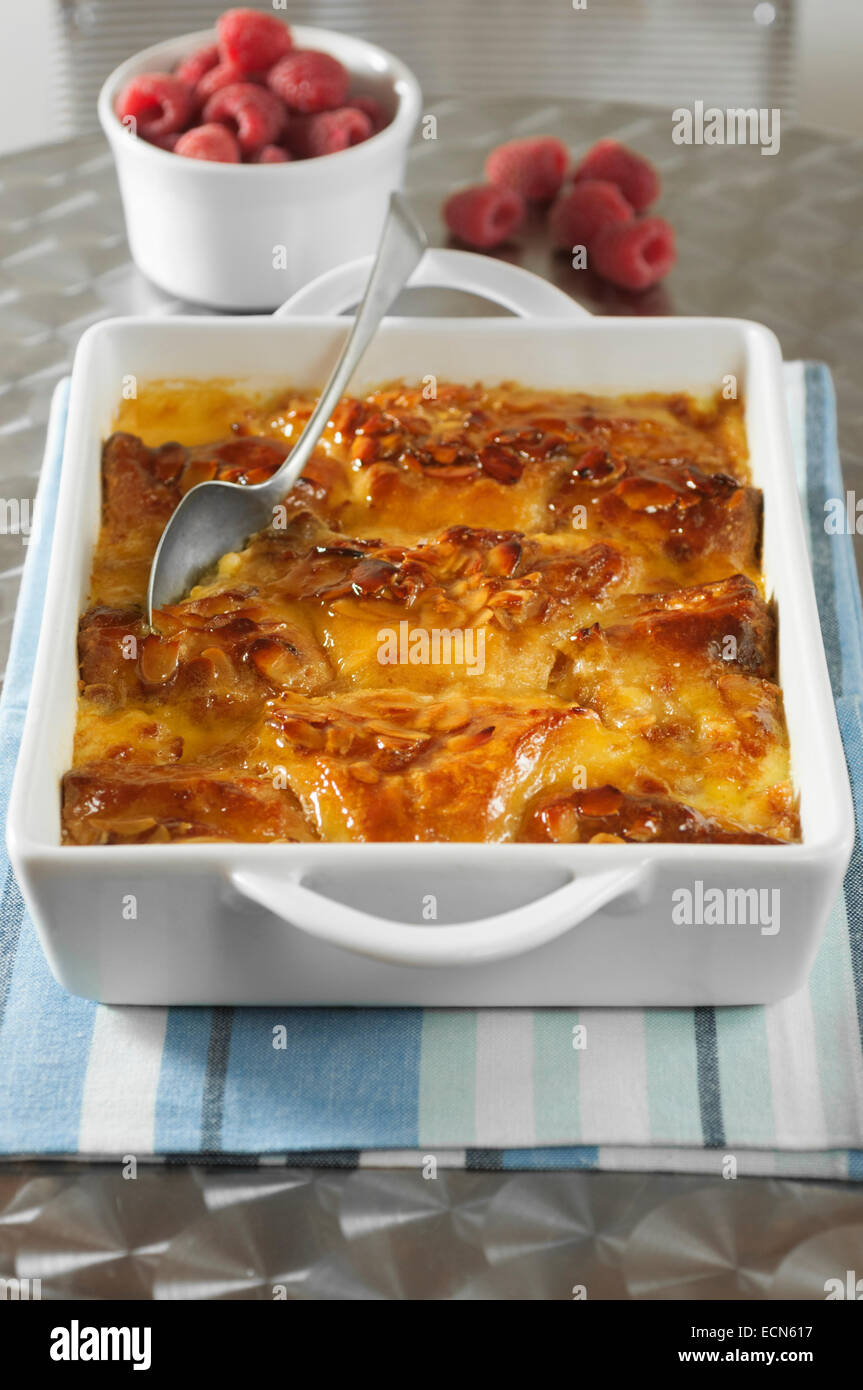 Almond croissant bread and butter pudding. Stock Photo