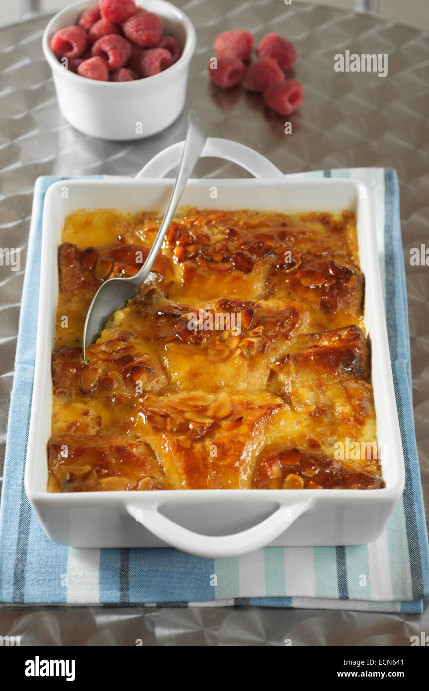 Almond croissant bread and butter pudding. Stock Photo