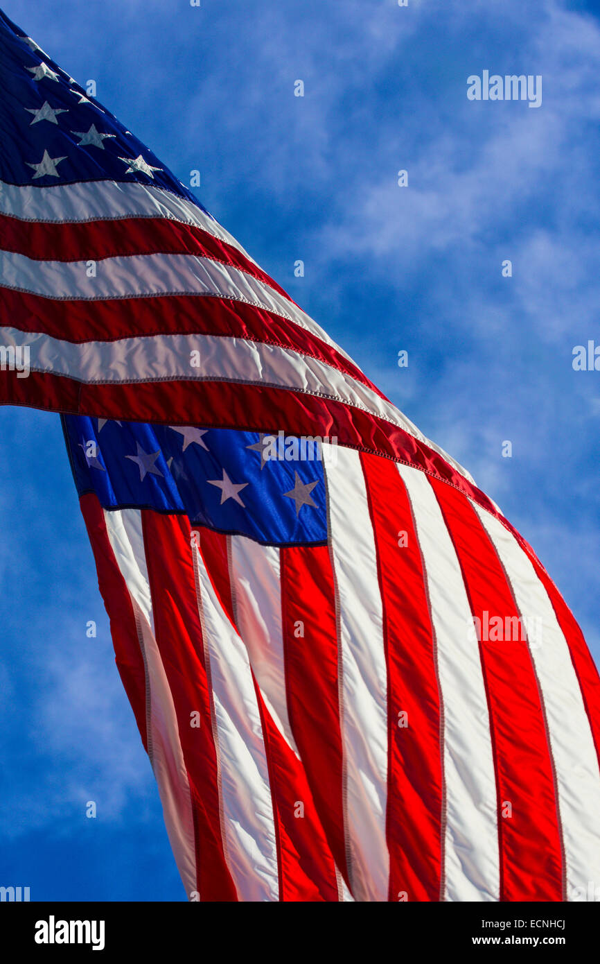 Closeup of portion of American flag against blue sky Stock Photo - Alamy