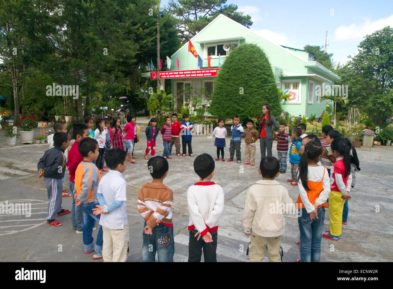 Young students outdoors at an elementary school in Da Lat, Vietnam. Stock Photo