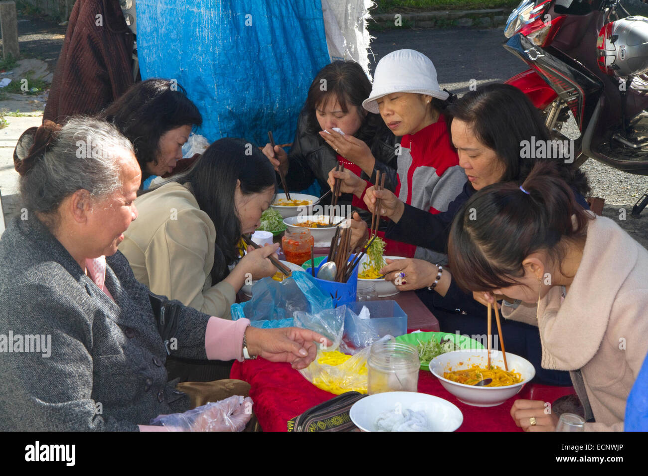 Teachers from the Pedagogical College of Da Lat eating breakfast, Vietnam. Stock Photo