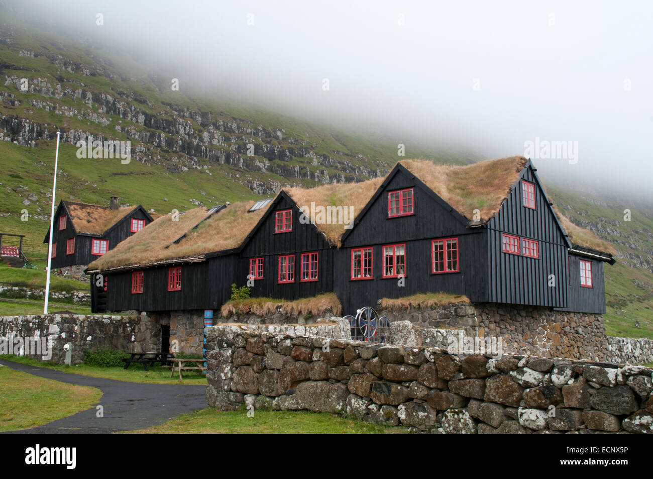 Kirkjubøargarður is the oldest still inhabited wooden house of the world. Since 11th century people live in this Faroe house. Stock Photo