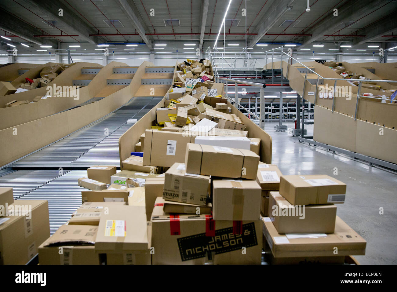 Nuremberg, Germany. 9th Dec, 2014. Piiles of parcels lie on trays for ...