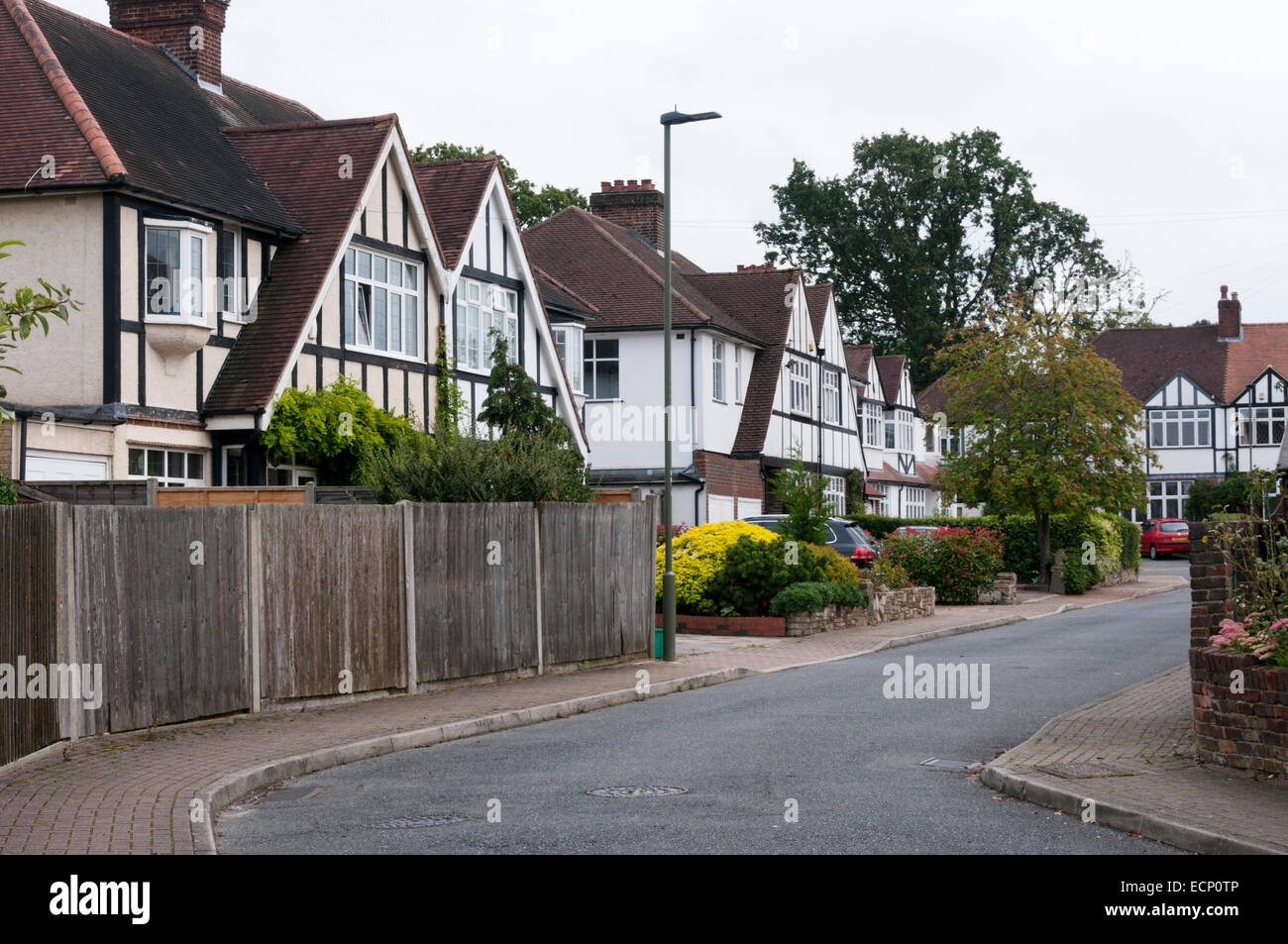 Houses in a narrow suburban road.  Druid's Way in Bromley, South London. Stock Photo