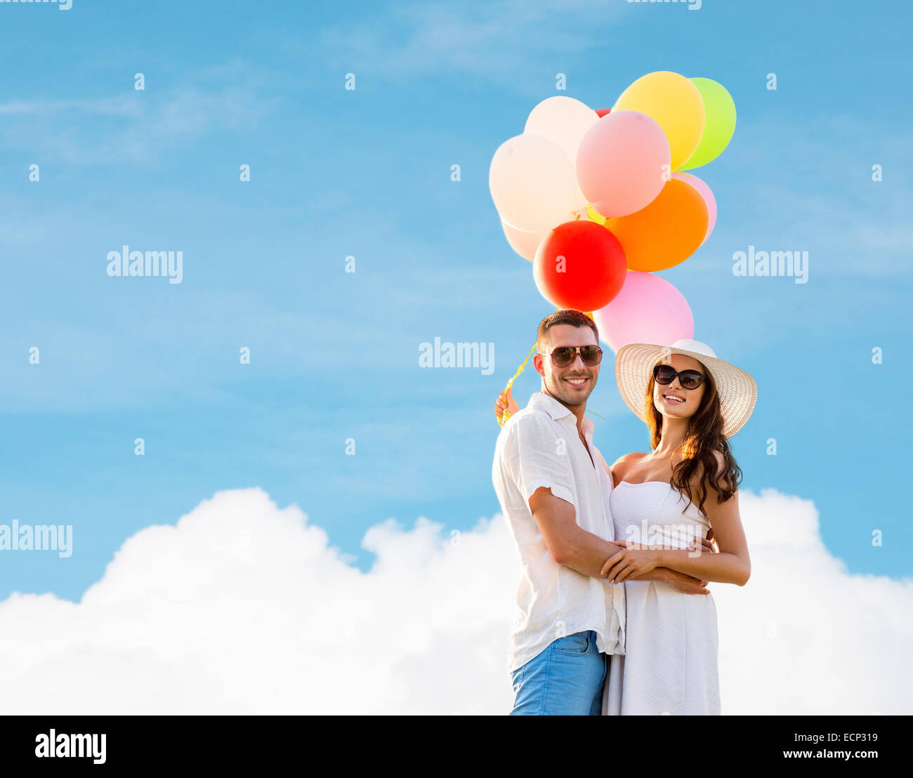 smiling couple with air balloons outdoors Stock Photo - Alamy
