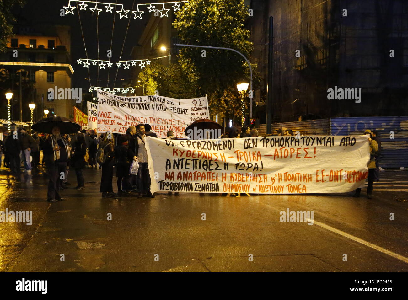 Athens, Greece. 17th December 2014. Protesters march to the Greek Government while the Greek parliamentarians run the first ballot for the election of the Greek President. Greeks opposed to the current government protested outside the Parliament while the parliamentarians inside went to the ballot box for the first ballot of the Greek Presidential election. The governmental candidate got only 160 of the required 200 votes. Credit:  Michael Debets/Alamy Live News Stock Photo