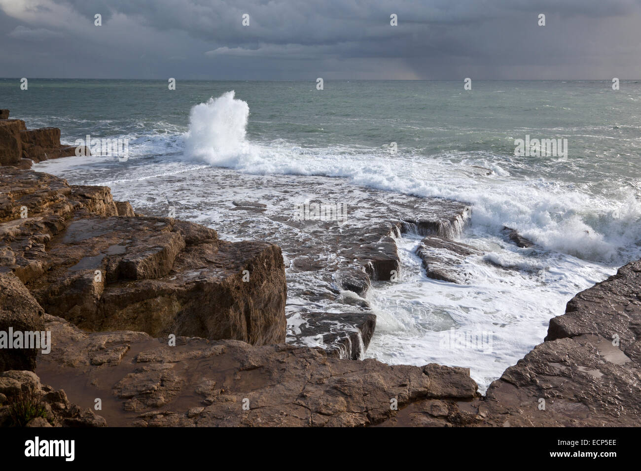 Rocky coastline and waves at Portland Bill in November, Dorset, England, UK Stock Photo