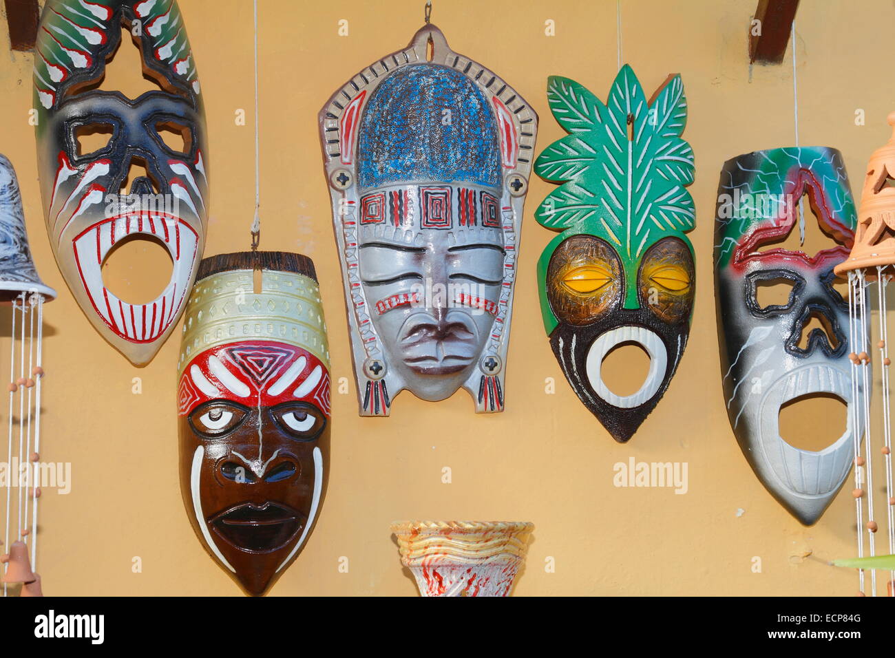 African Cuban ceremonial abstract masks hanging on the wall, Cuba Stock