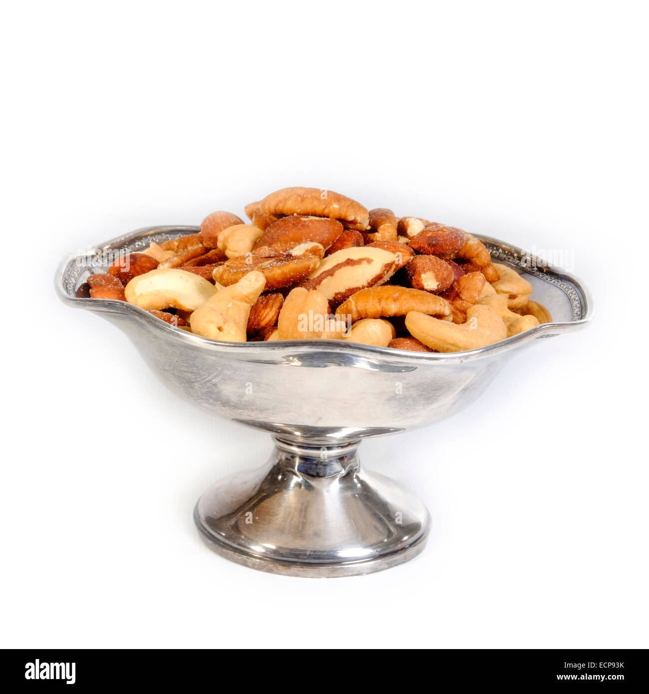Bowl of salted mixed nuts snack finger food isolated on white background Stock Photo