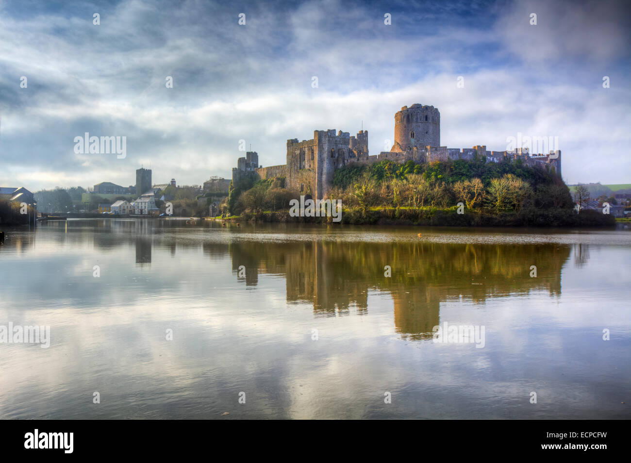 Pembroke Castle captured across Pembroke River. Stock Photo