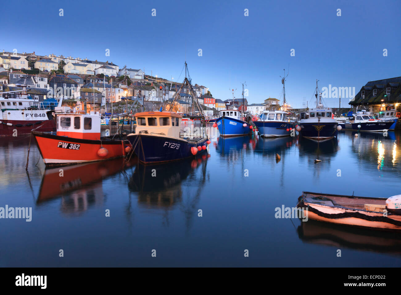 Boats captured during twilight at  Mevagissey Harbour Stock Photo