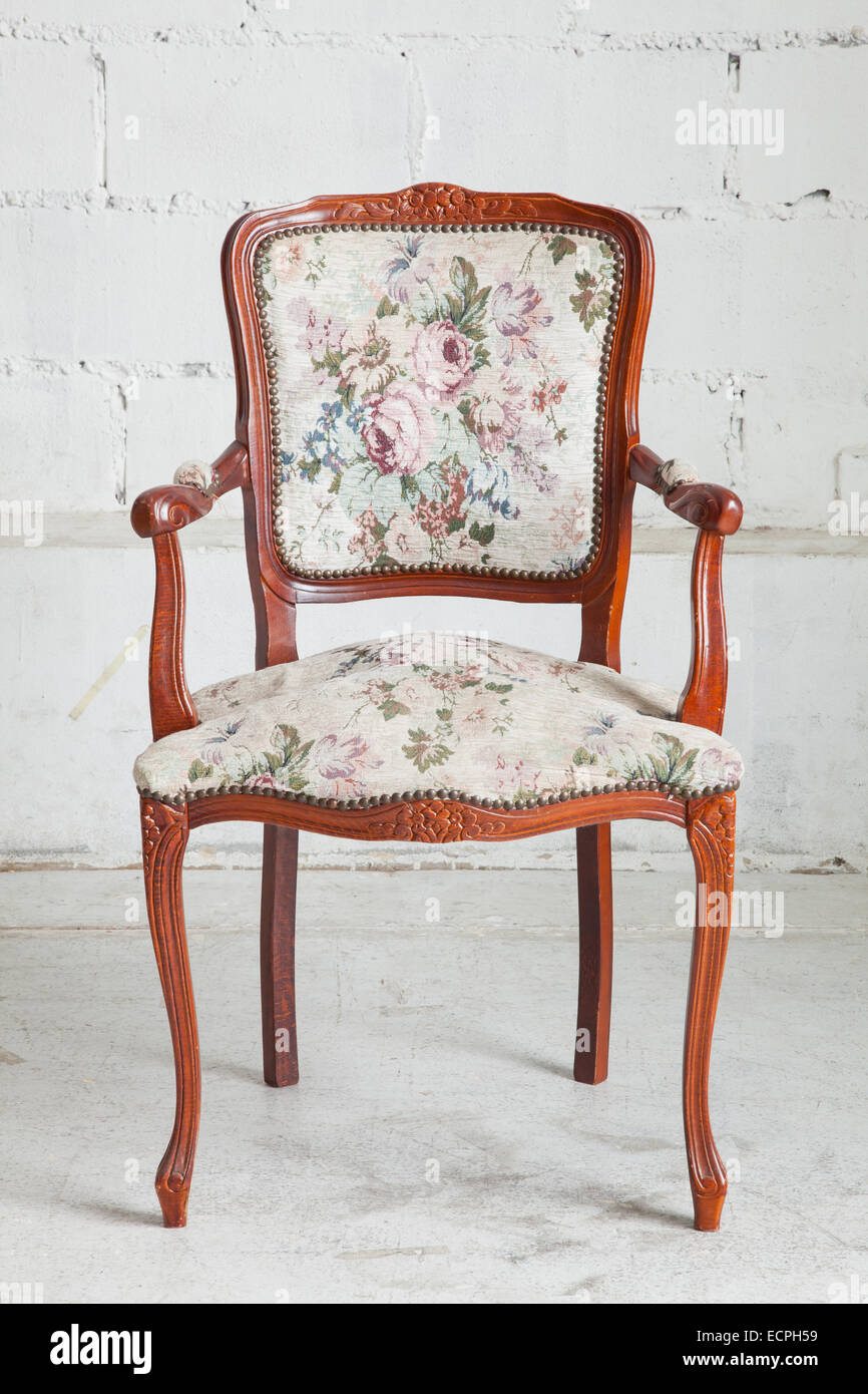 wooden vintage armchair sofa in vintage room Stock Photo - Alamy