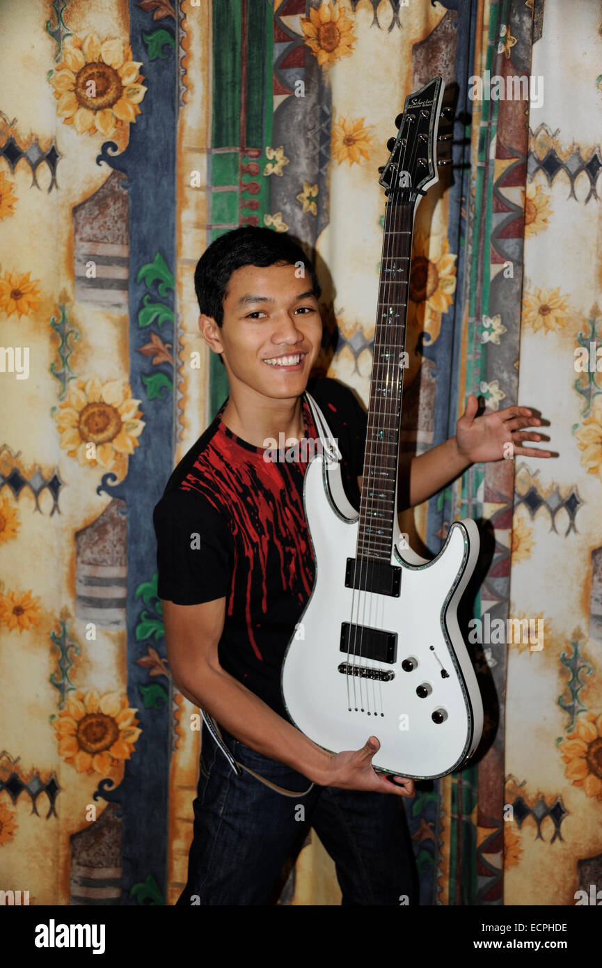 Boy Play Electric Guitar Schecter Hellraiser White teenager fifteen Old 