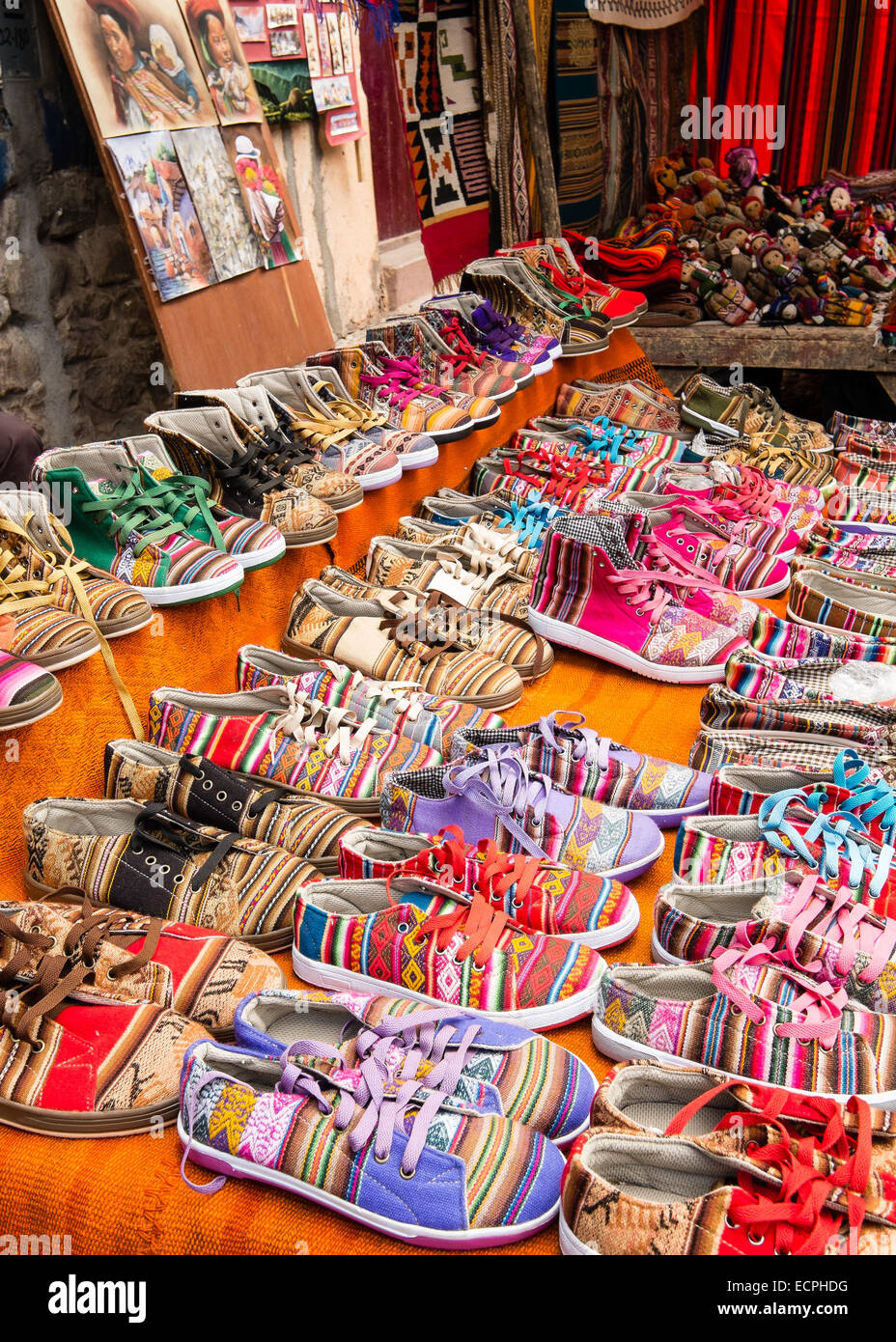 Brightly coloured shoes on sale in Pisac Market, Peru Stock Photo