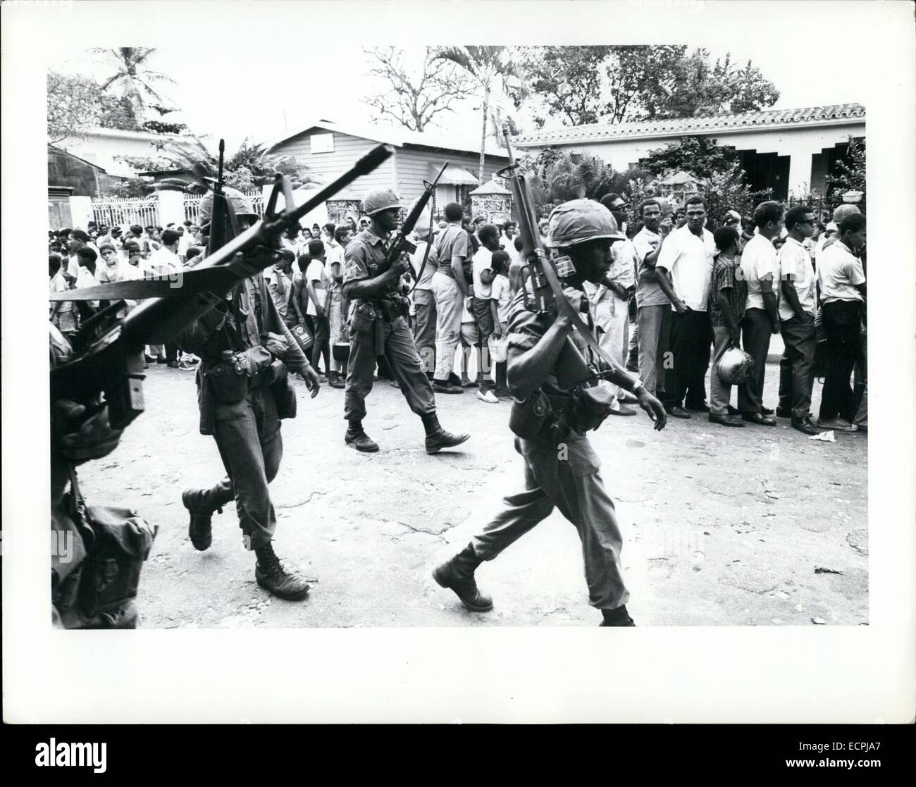 Dominican Republic. 05th May, 1965. U.S. Troops patrolling food line