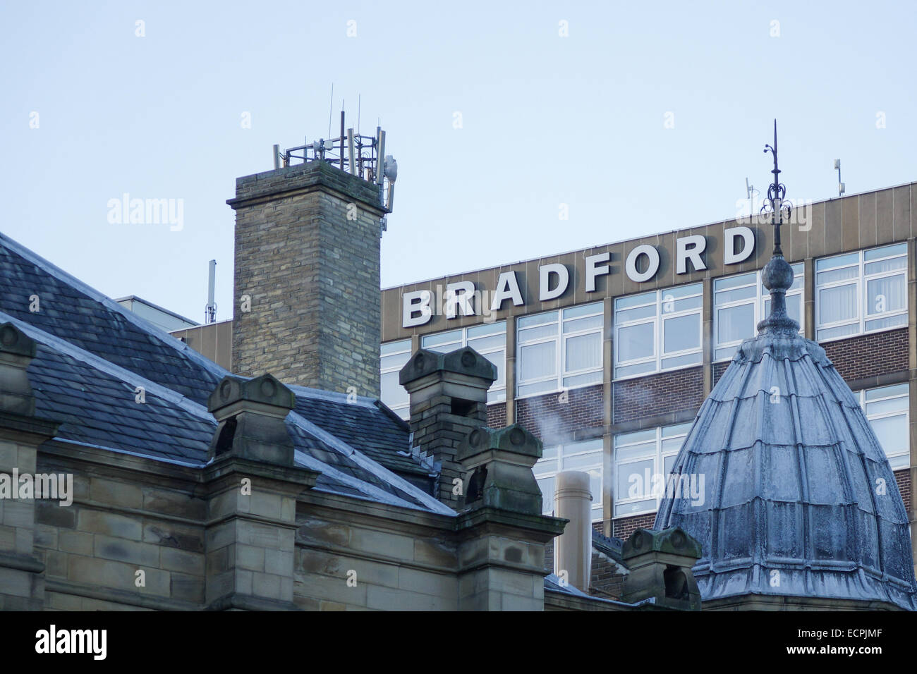 Bradford College buildings with Bradford University logo on wall Stock
