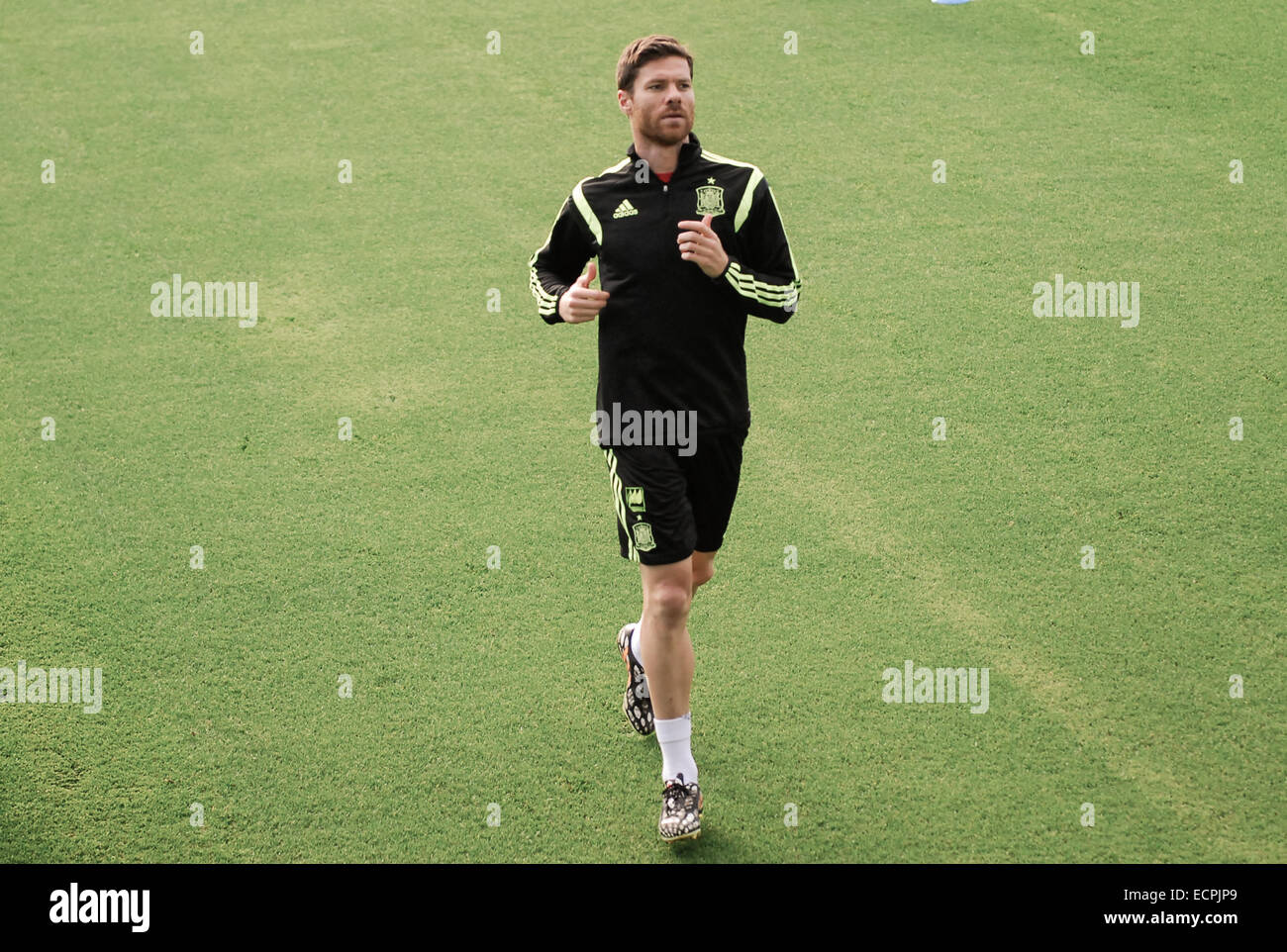 The Spain national football team holds a training practice in Curitiba, Brazil, following their loss to The Netherlands on Friday  Featuring: Xabi Alonso Where: CURITIBA, PR When: 14 Jun 2014 Stock Photo