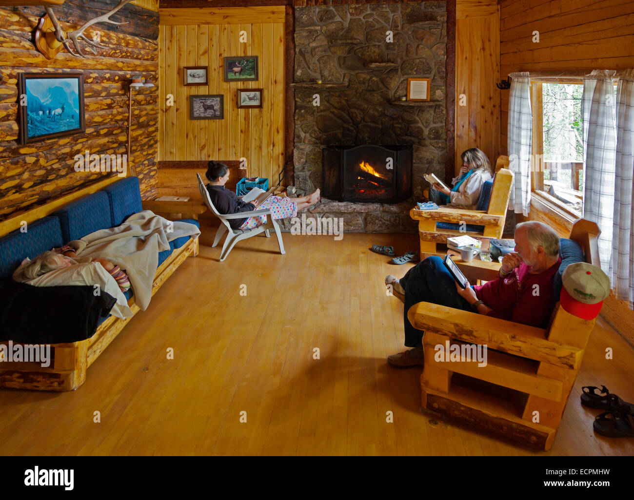 VACATIONERS enjoy a rustic yet comfortable cabin at OLEO RANCH at 10500 feet - SOUTHERN COLORADO MR Stock Photo