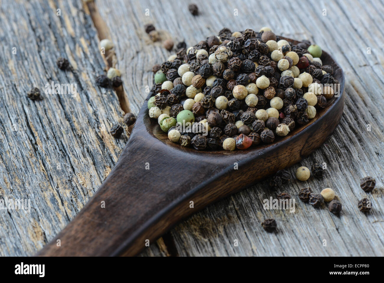 Peppercorn and Spoon Stock Photo