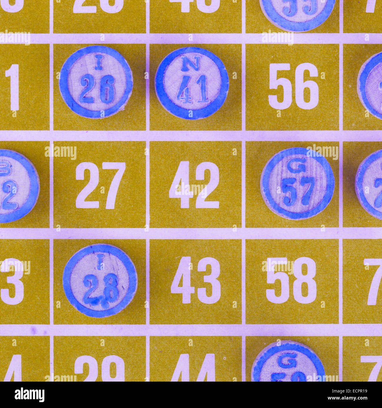 Yellow bingo card being used (white chips Stock Photo Alamy