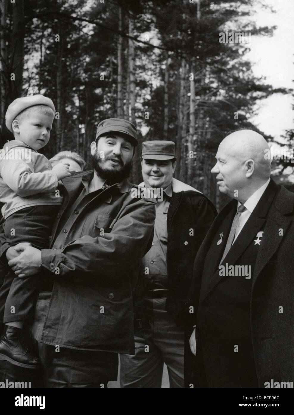 The US and Cuba announced an agreement between the two countries that will be a first step toward normalizing relations. PICTURED: May 6, 1963 - Moscow, Russia - A Cuban revolutionary leader who led his country from January 1959 until his retirement in February 2008, FIDEL CASTRO transformed Cuba into the first communist state in the Western Hemisphere. PICTURED: FIDEL CASTRO visiting NIKITA KHRUSHCHEV's summer house - EMILIO NAVARRO in the middle. © KEYSTONE Pictures USA/ZUMAPRESS.com/Alamy Live News Stock Photo