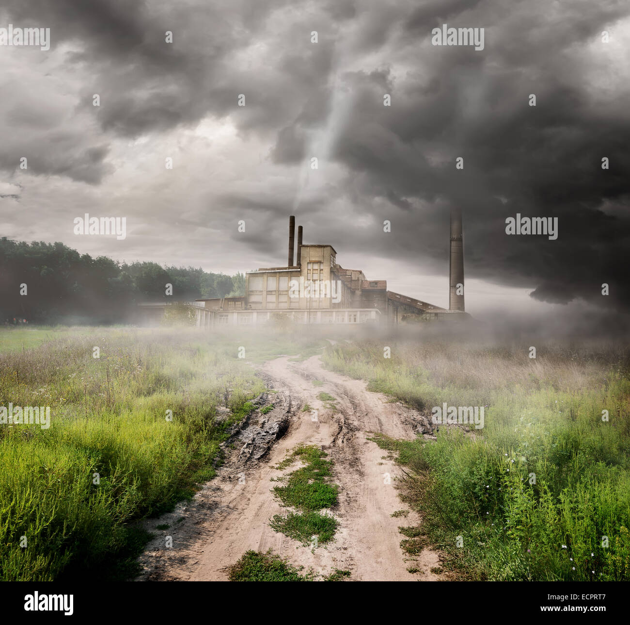 Thermal station and country road under storm clouds Stock Photo - Alamy