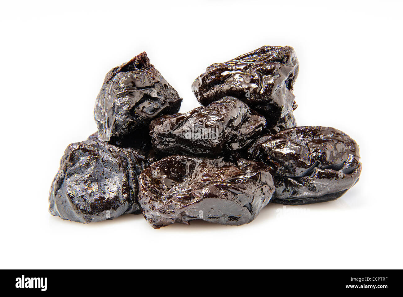 Dried prunes on a white background Stock Photo Alamy