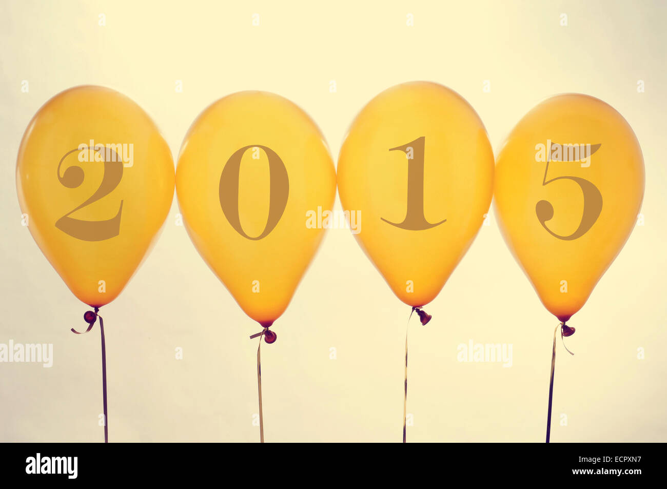 numbers forming 2015, as the new year, on golden balloons, with a filter effect Stock Photo