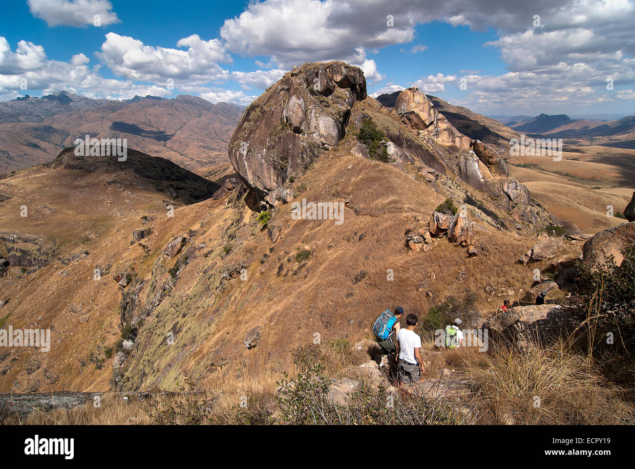 Trekkers on a guided day-walk in the Tsaranoro Massif, Madagascar. Stock Photo