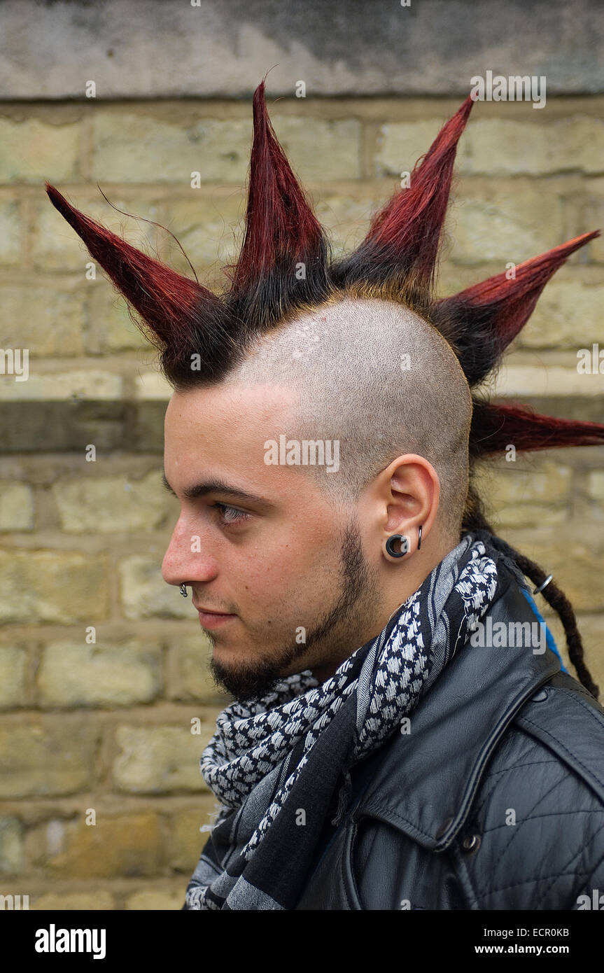 Hair is a big deal with punks. Mohicans, spikes and other weird shapes that stand up as high as possible are popular. Stock Photo