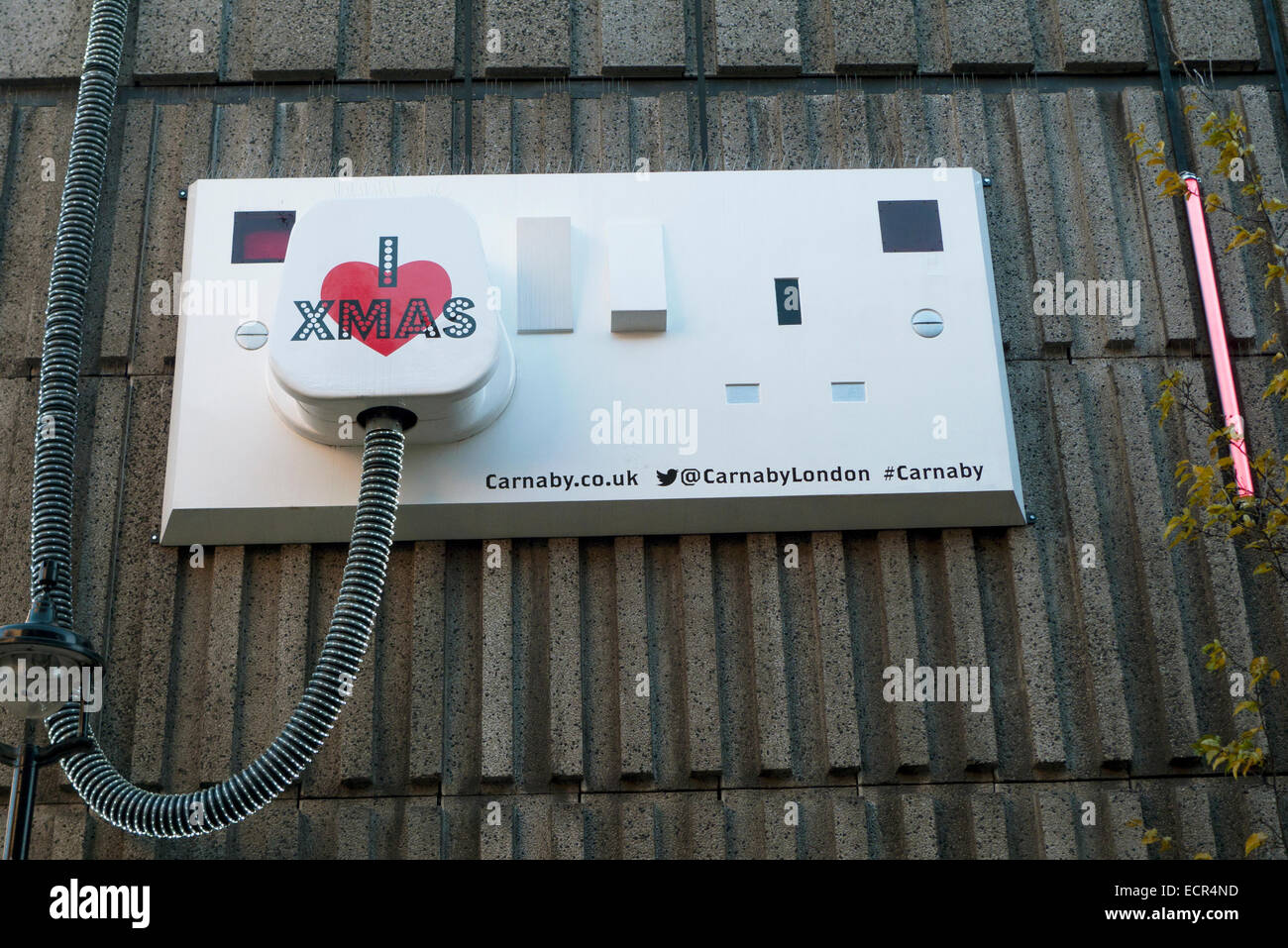 I love Xmas electrical plug artwork on Ganton Street near Carnaby Street in West London UK KATHY