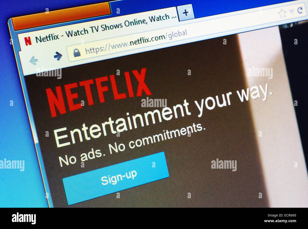 Netflix.com homepage on the computer screen. Netflix is a provider on-demand streaming media. Editorial use only Stock Photo