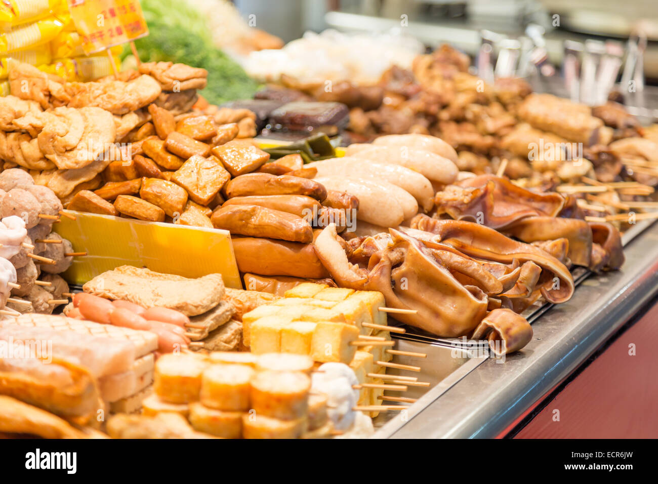 Street food at a vendor at a night market in Taipei Stock Photo