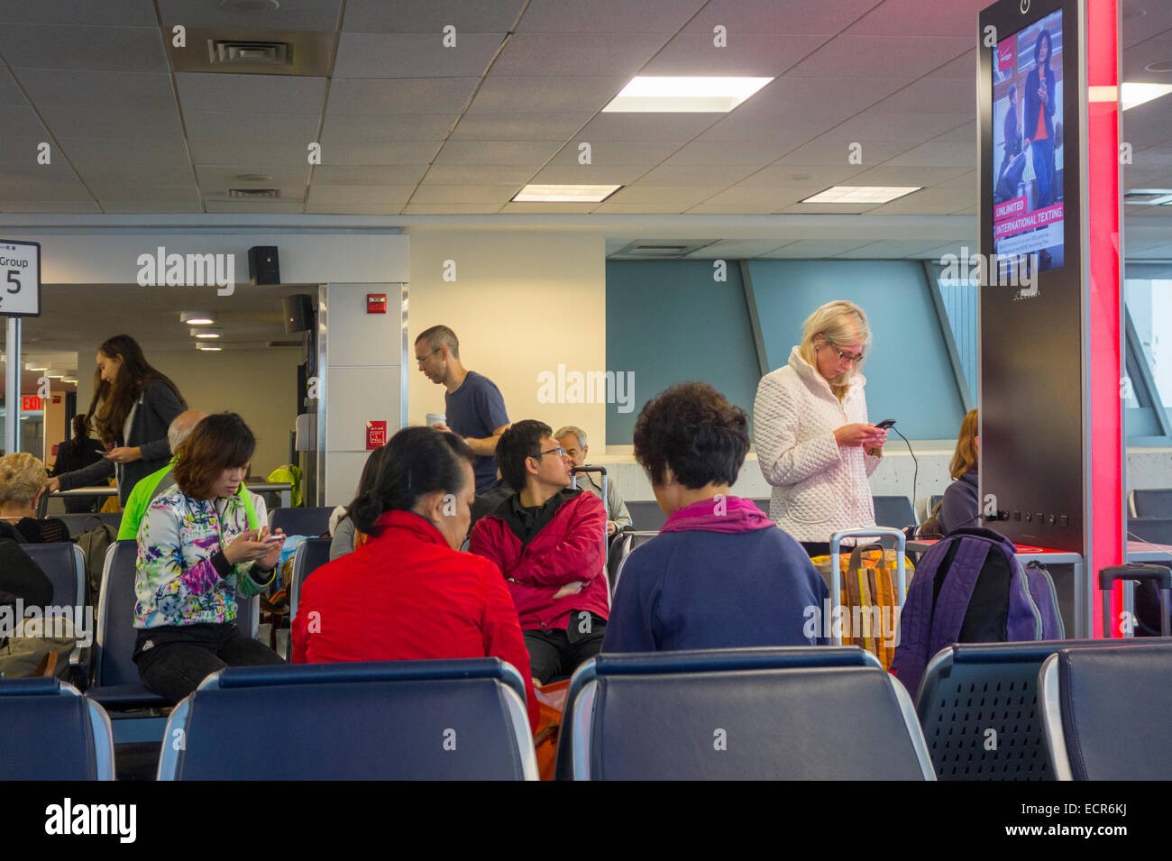 passengers waiting in JFK airport terminal Stock Photo Alamy