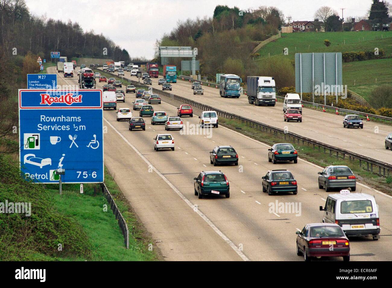 Vehicle traffic heading eastbound on the M27 near Rownhams service station, Southampton, Hampshire UK in the year 2000. Stock Photo
