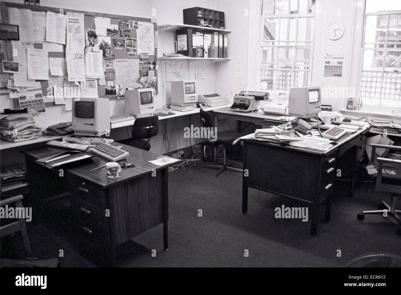 Provincial UK newspaper newsroom as computers were replacing typewriters in 1987. Stock Photo