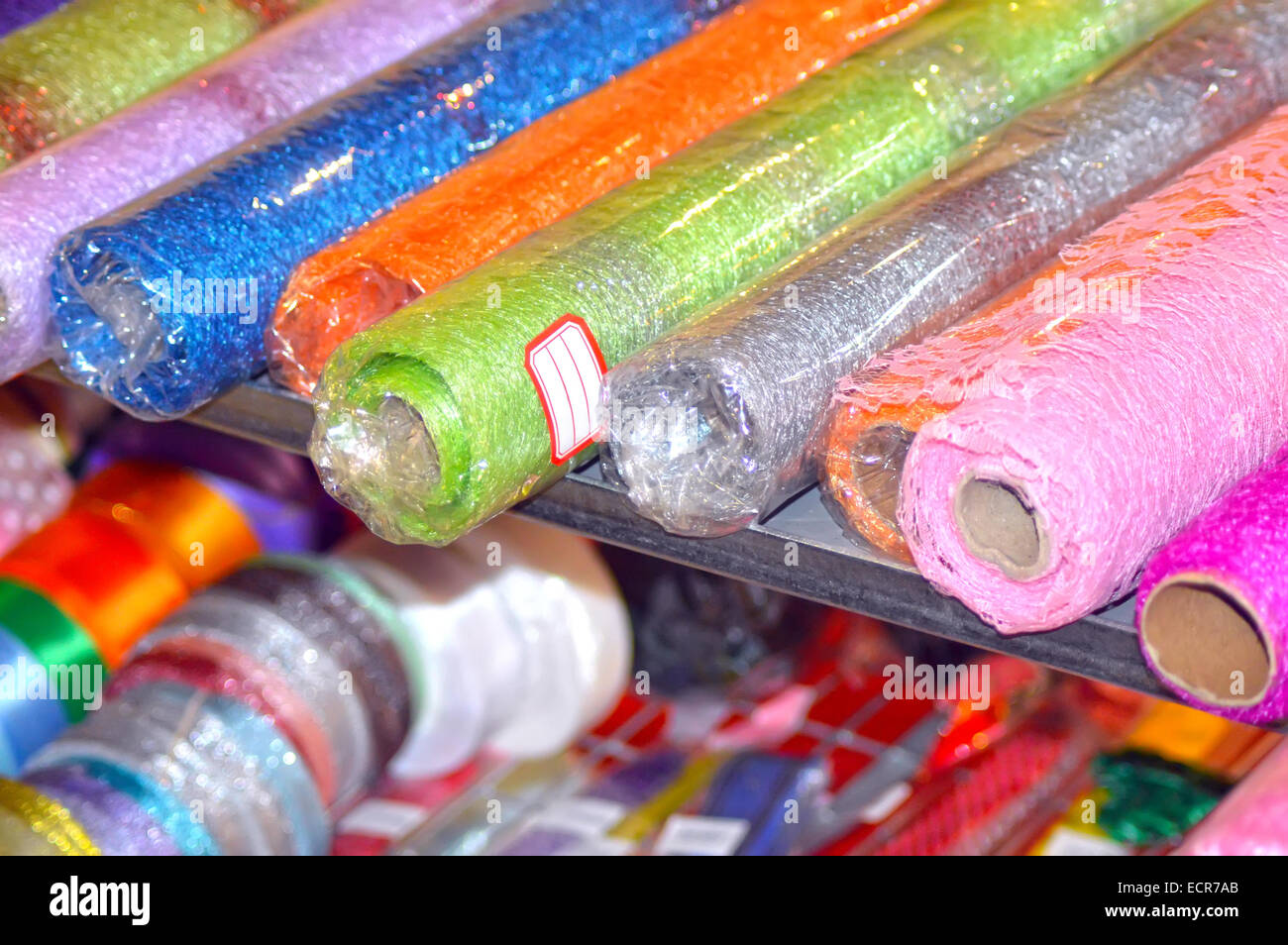 Colored cellophane and mesh for packing flowers Сolored rolls Stock Photo