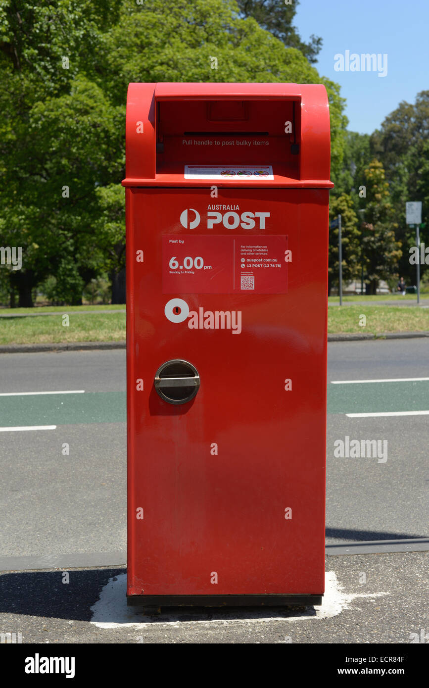 Red Australia Post box on a roadside Stock Photo