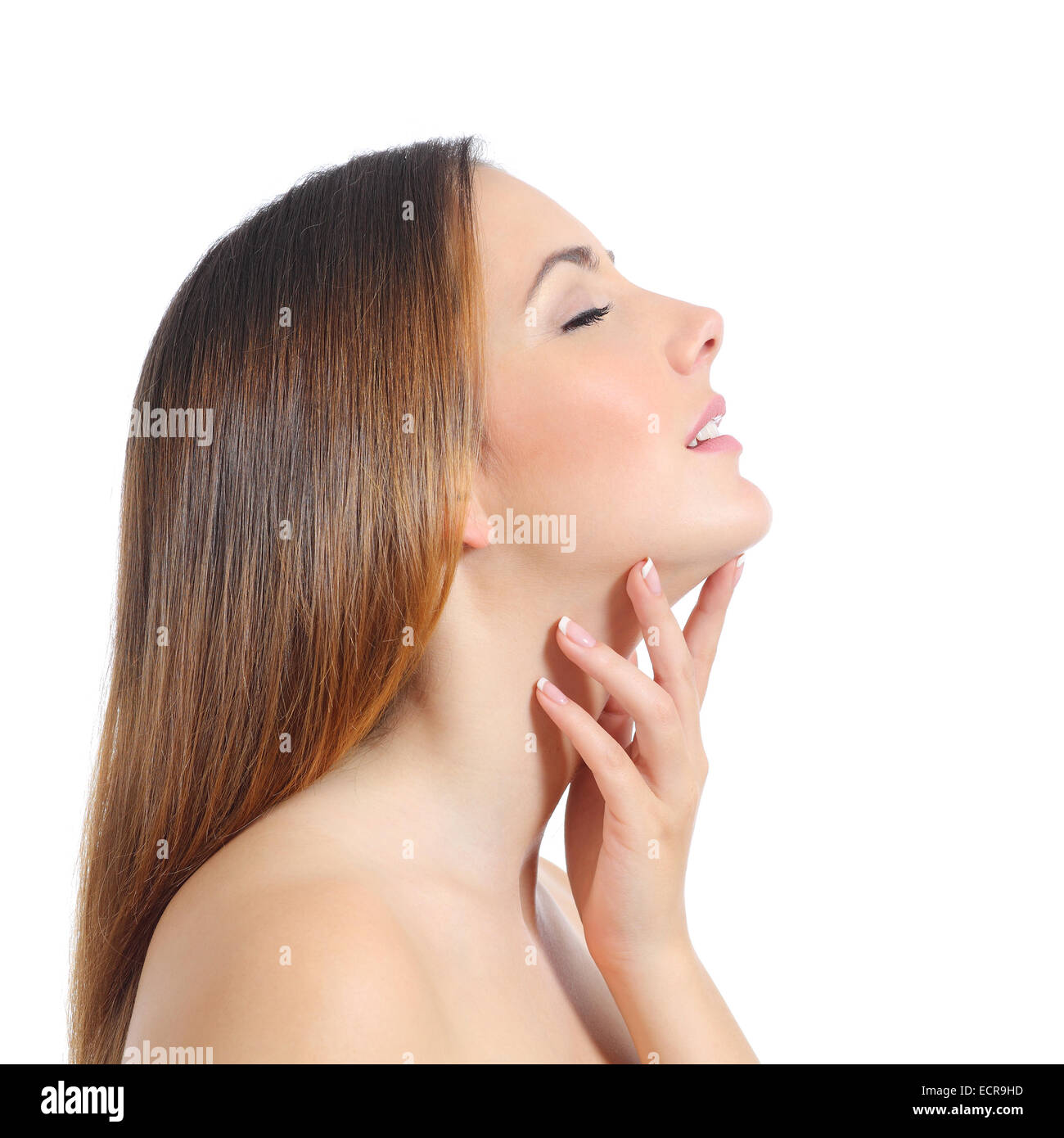 Profile of a beautiful woman with perfect skin and manicure isolated on a white background Stock Photo
