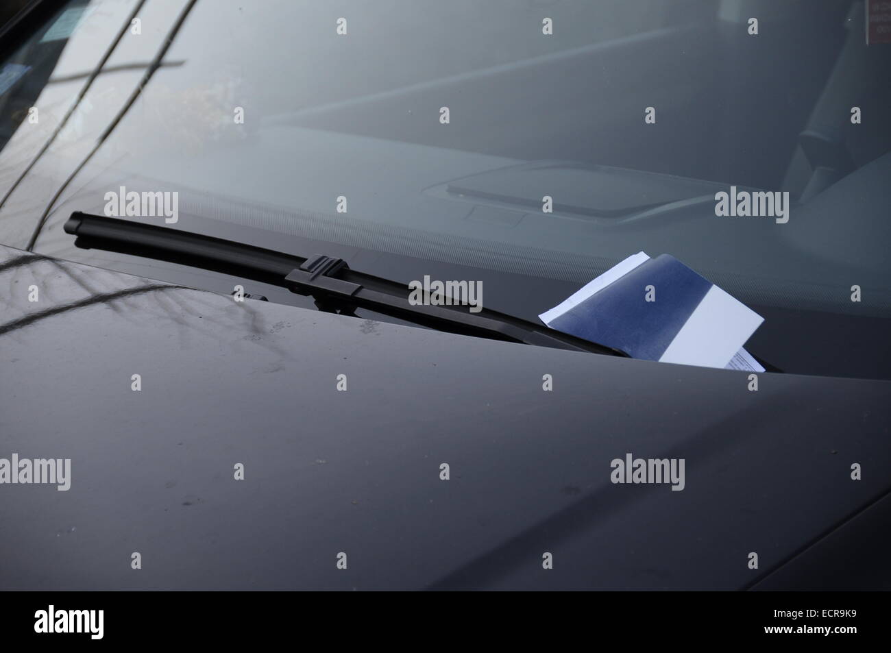 French contravention slipped under the windshield wiper Stock Photo Alamy