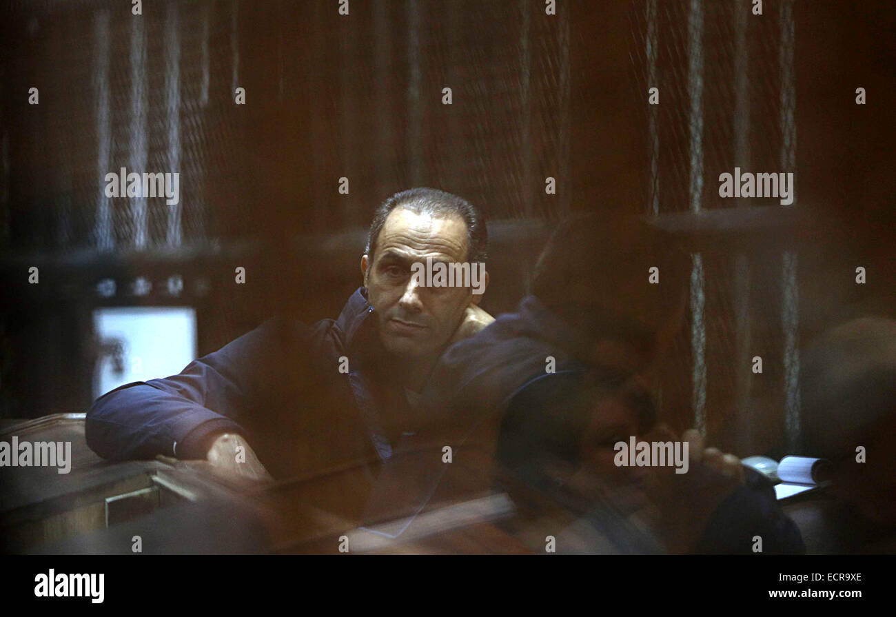 Cairo, Egypt. 17th Dec, 2014. Gamal Mubarak, the son of former president Hosni Mubarak sits in a courtroom cage in Cairo, December 18, 2014. The two sons of Egypt's former president were back in court facing charges of stock market manipulation Credit:  Stringer/APA Images/ZUMA Wire/Alamy Live News Stock Photo