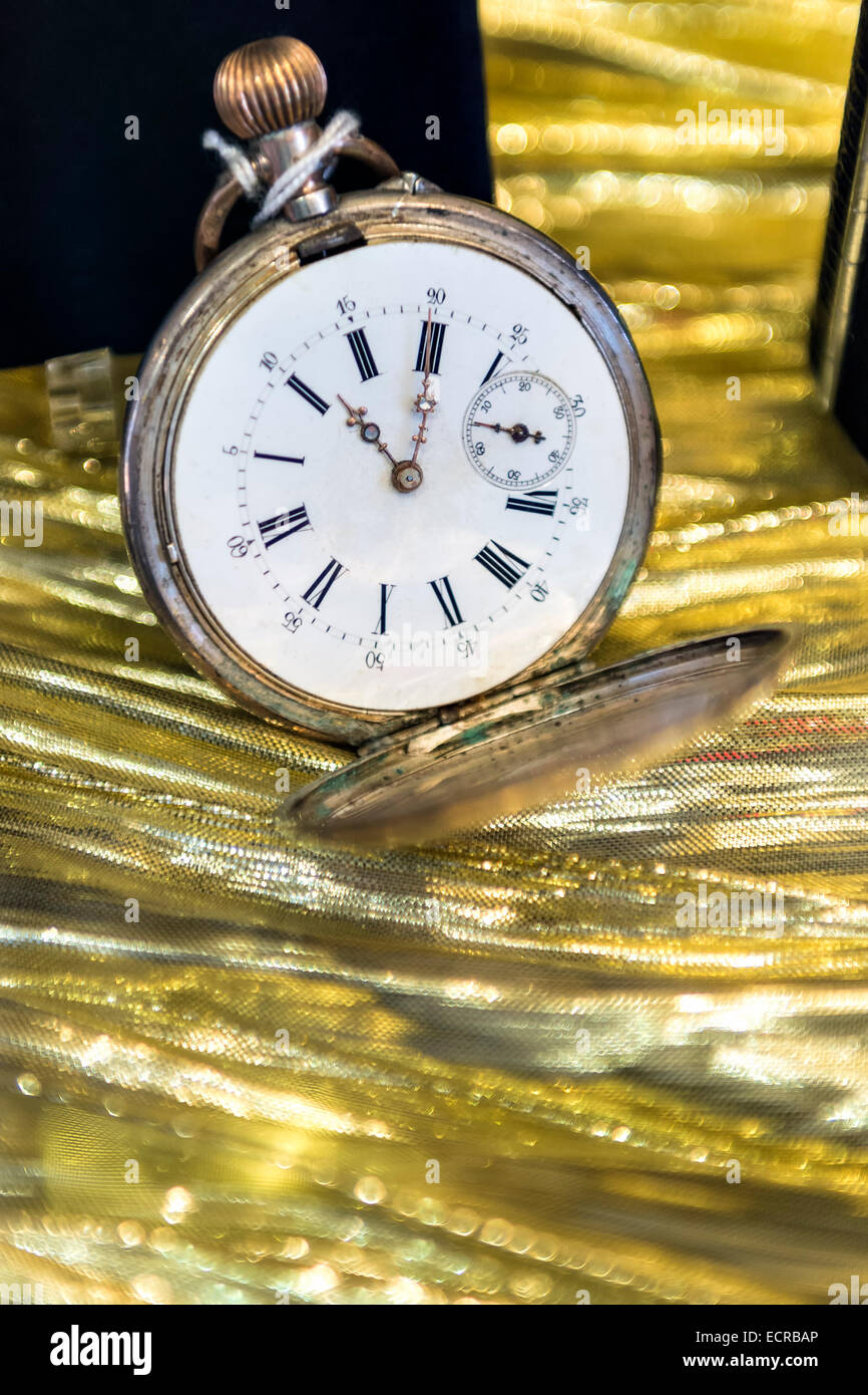 Image of a historic pocket watch on a gold background Stock Photo