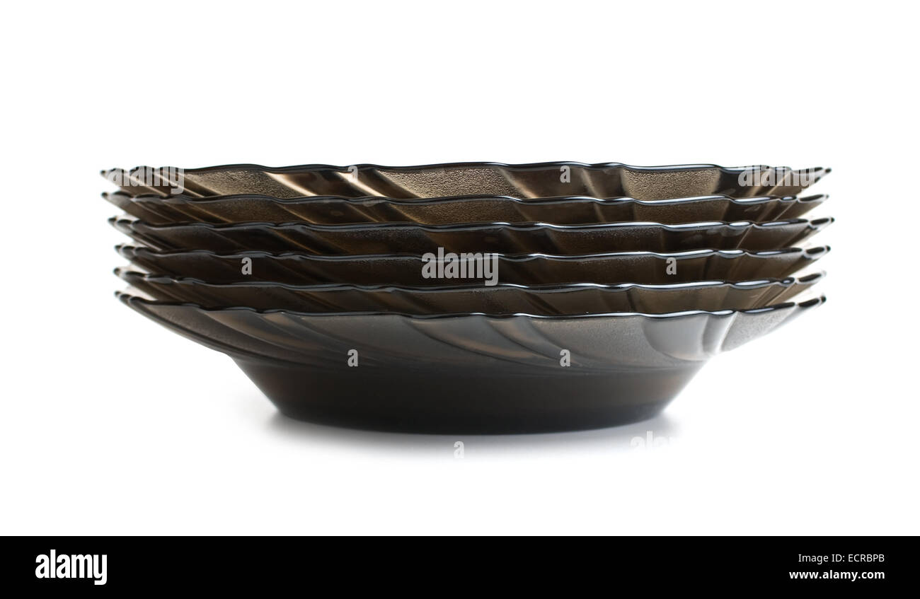 stack of brown plates isolated on a white background Stock Photo - Alamy